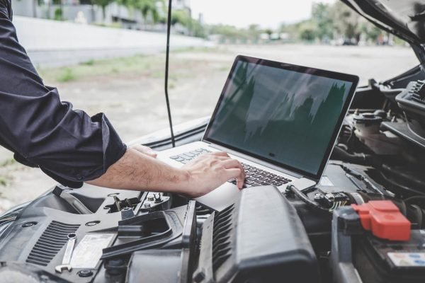 Car-engine-laptop-diagnostics-1536x1024